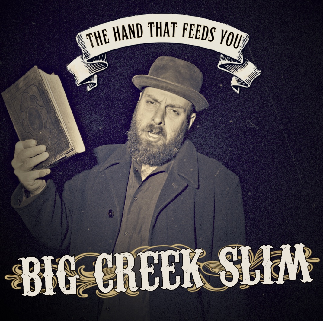 The Hand That Feeds You album artwork featuring Big Creek Slim holding a book